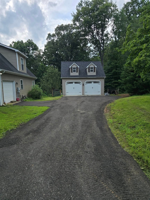 Long private gravel driveway graded by Innovative Earthworks
