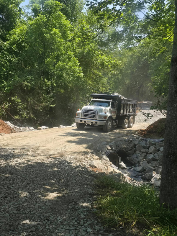 Private road grading and drainage improvements by Innovative Earthworks